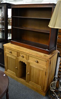 Lot 1084 - A Victorian pine dresser base, together with an open bookcase