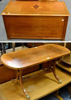 Lot 1086 - A modern inlaid blanket box, together with a similar inlaid coffee table with brass ball feet...