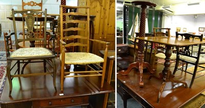 Lot 1095 - A 19th century mahogany tilt top tripod table, two occasional chairs and a torchere (4)