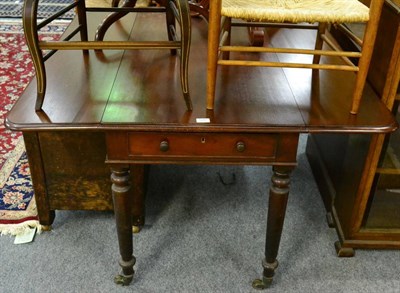 Lot 1097 - An early 19th century mahogany drop leaf table with one single central drawer