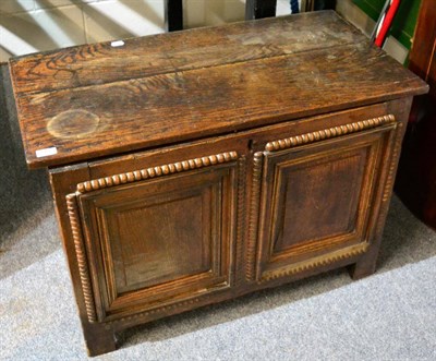 Lot 1103 - An oak blanket box