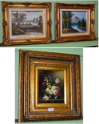 Lot 1182 - A reproduction still life of flowers, oil on board together with two 20th century landscape...