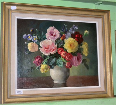 Lot 1185 - Thomas Bradley (20th century) a still life of flowers, oil on board