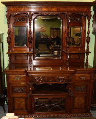 Lot 1212 - A late Victorian carved walnut mirror back sideboard, with superstructure back, the base of...