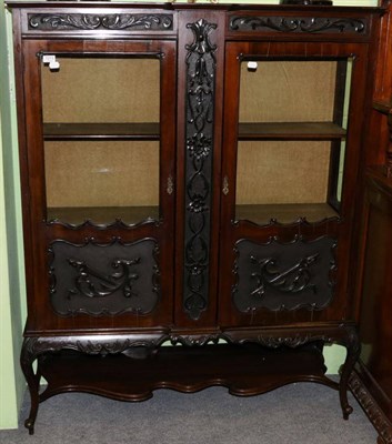 Lot 1213 - A 19th century mahogany glazed display cabinet