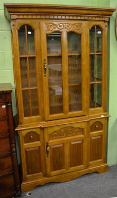 Lot 1217 - A glazed oak display cabinet