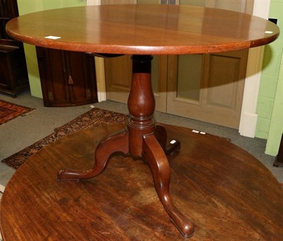 Lot 1232 - A mahogany fold over table