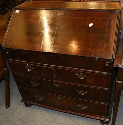 Lot 1236 - An 18th century walnut bureau