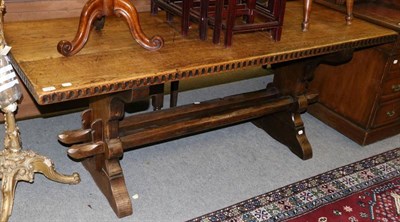 Lot 1243 - An oak refectory table, 20th century