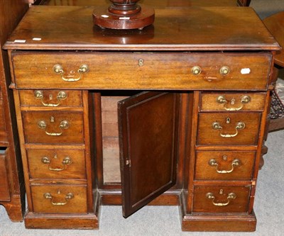 Lot 1252 - A George III mahogany desk