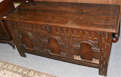 Lot 1257 - An oak coffer