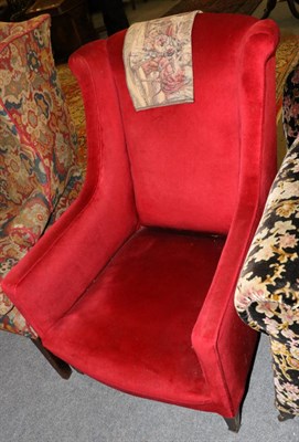 Lot 1265 - A Georgian style red upholstered armchair