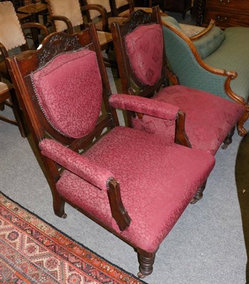 Lot 1272 - A pair of late Victorian walnut framed armchairs