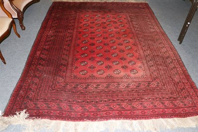 Lot 1286 - Turkmen carpet, North Afghanistan, the faded crimson field with columns of quartered guls...