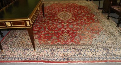 Lot 1294 - Mahal carpet, West Iran, the strawberry field of vines around a medallion enclosed by spandrels and