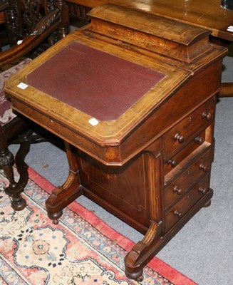 Lot 1323 - A 19th century walnut Davenport