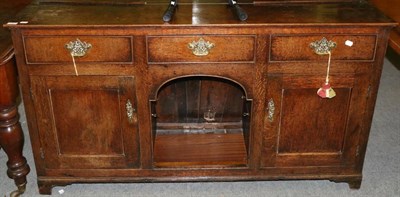 Lot 1327 - A George III oak dresser base