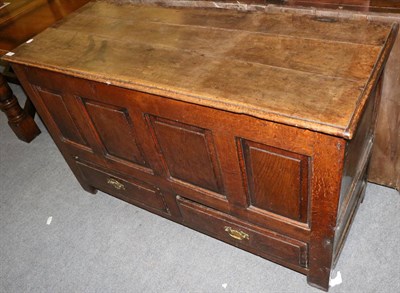 Lot 1330 - An 18th century oak mule chest