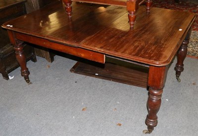 Lot 1331 - A Victorian mahogany dining table with one extra leaf