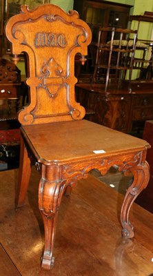 Lot 1332 - A Victorian oak hall chair