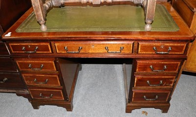 Lot 1335 - A leather inset mahogany pedestal desk