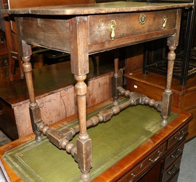 Lot 1336 - An 18th century oak side table