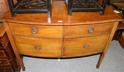 Lot 1338 - A George III mahogany bow fronted side board