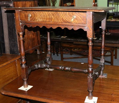 Lot 1339 - An 18th century oak side table