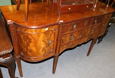 Lot 1346 - A Georgian style mahogany sideboard