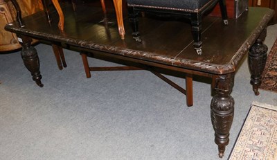 Lot 1348 - Victorian carved oak extending dining table fitted two additional leaves