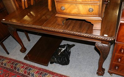 Lot 1353 - A Victorian wind out mahogany dining table on ball and claw feet