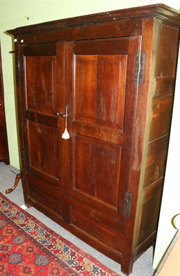 Lot 1358 - A 19th century panelled oak cupboard