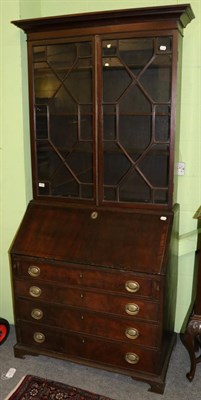 Lot 1363 - A 19th century glazed bureau bookcase