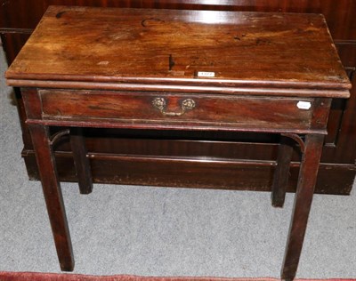 Lot 1377 - A mahogany fold over table (single drawer)