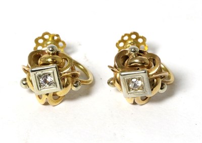 Lot 8 - A pair of white stone set earrings, a white round cut stone in a square setting, to a beaded...