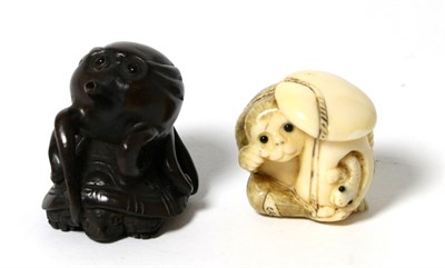 Lot 9 - A late 19th century Japanese netsuke signed and a netsuke modelled as an octopus on a turtles back