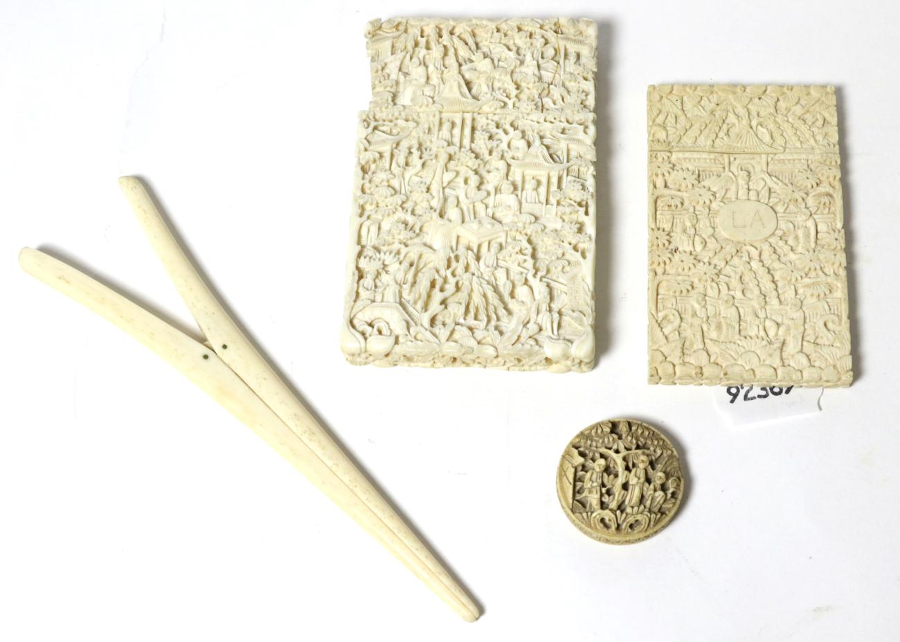 Lot 19 - A Cantonese ivory card case; another; a small box; and glove stretchers, all circa 1900