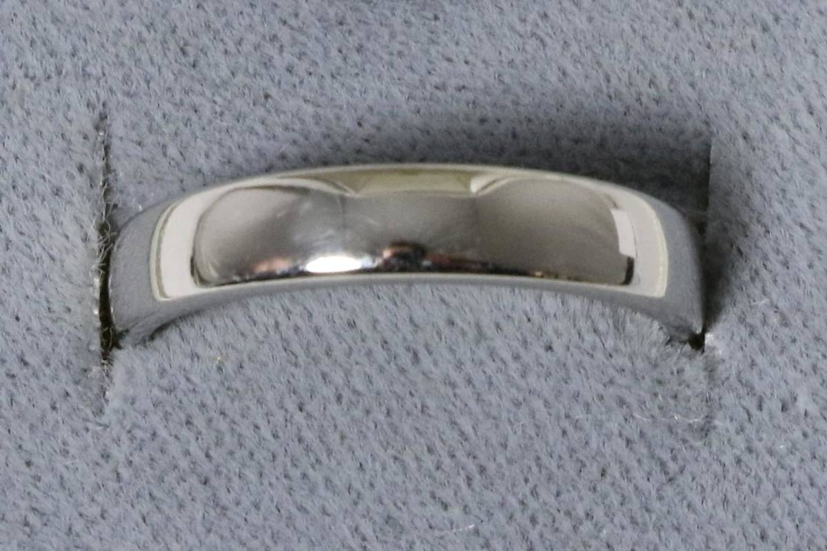 Lot 34 - A platinum band ring, finger size L