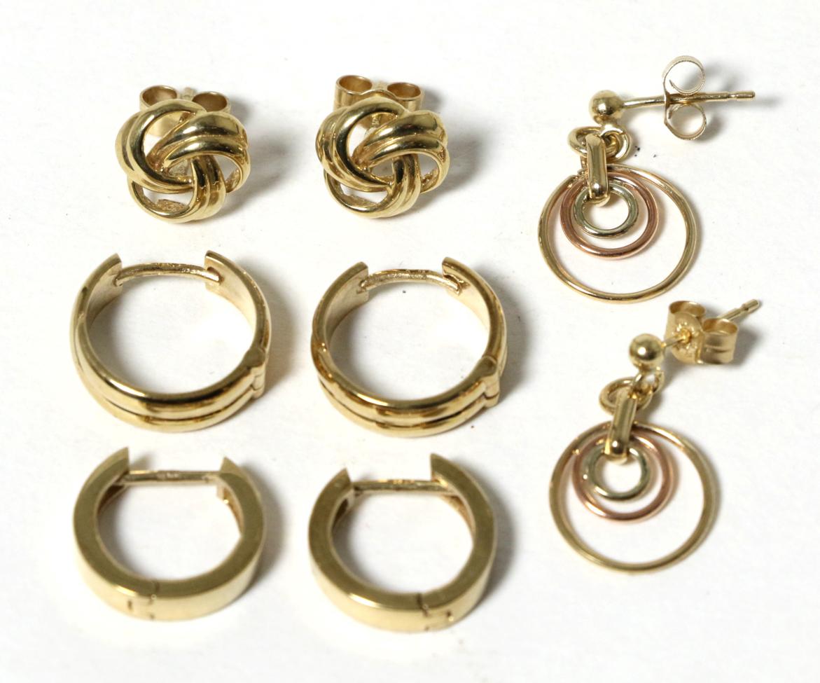 Lot 43 - Four pairs of 9 carat gold earrings, comprising two pairs of hoop earrings, a pair of drop earrings