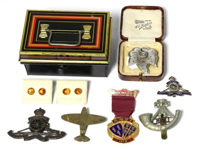 Lot 49 - A paste and enamel Royal Artillery sweetheart brooch; together with another artillery badge, a...