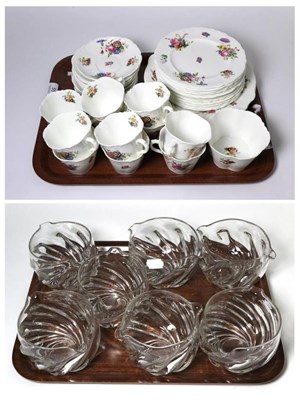 Lot 55 - A set of seven Wrythen glass rinsers; and a Cauldon china tea service decorated with floral...
