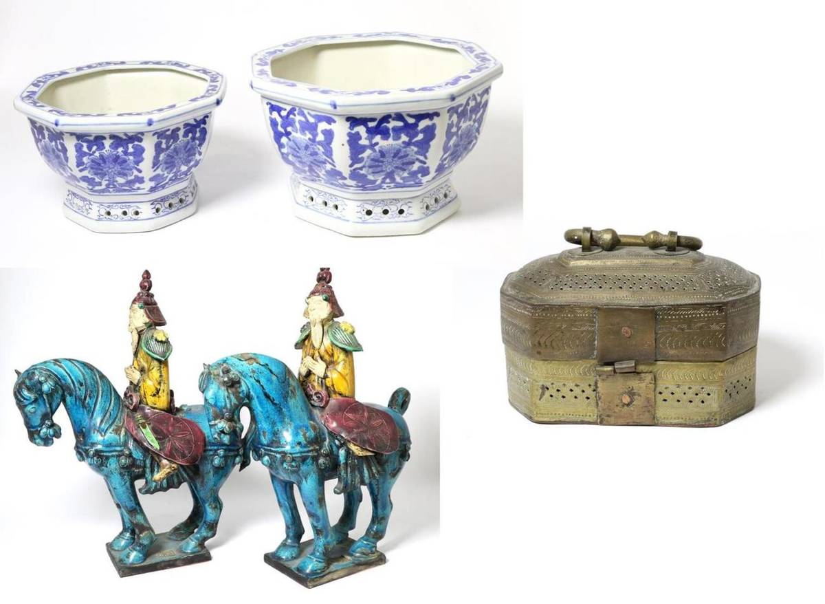 Lot 63 - Two Chinese pottery models of figures on horseback, each signed etc