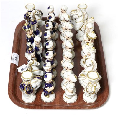 Lot 64 - A Royal Dux figural porcelain chess set after a Meissen design