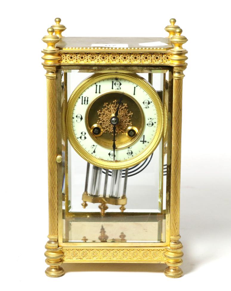 Lot 67 - A gilt brass four glass striking mantel clock with a twin mercury tube pendulum, striking on a gong