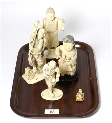 Lot 68 - A group of four Meiji Period Japanese ivory okimonos; and a netsuke of similar date