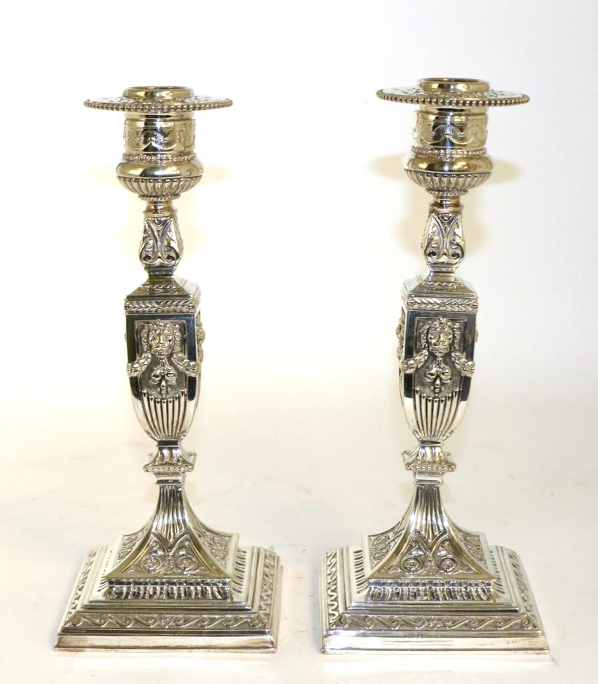 Lot 92 - A pair of Victorian electroplated candlesticks, James Dixon & Sons, of George III influence...