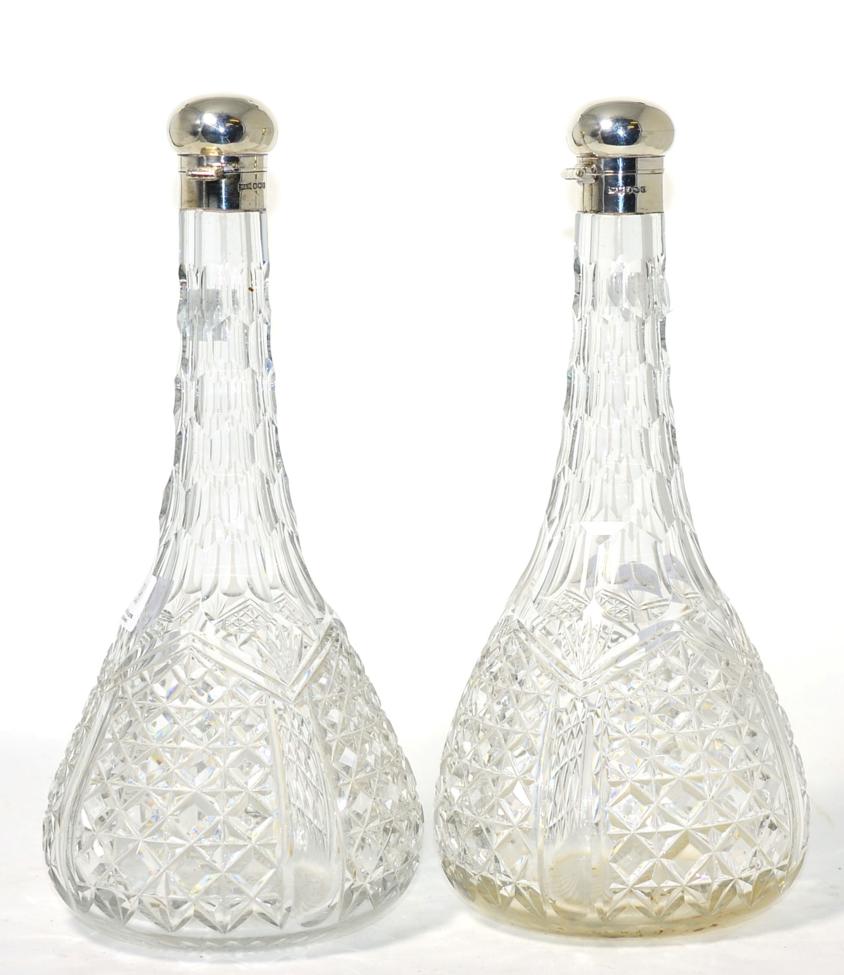 Lot 96 - Pair of silver mounted cut glass hinged decanters by Walker & Hall (one hinge a.f.)