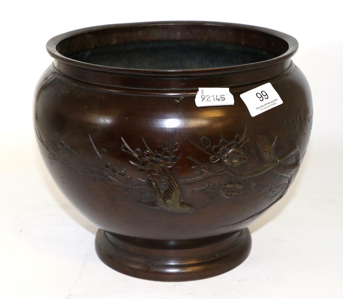 Lot 99 - Japanese Meiji Period bronze jardiniere, decorated with flowers and trees