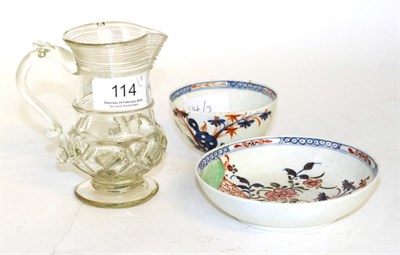 Lot 114 - A Lowestoft porcelain tea bowl and saucer; and an 18th century glass jug (a.f.)