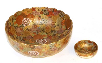 Lot 121 - A Japanese Satsuma pottery bowl; and another similar, smaller (2)